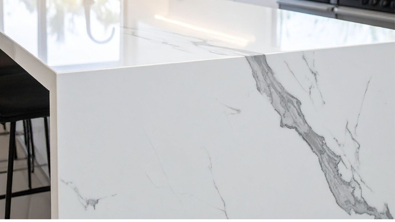 White quartz worktop with a waterfall edge